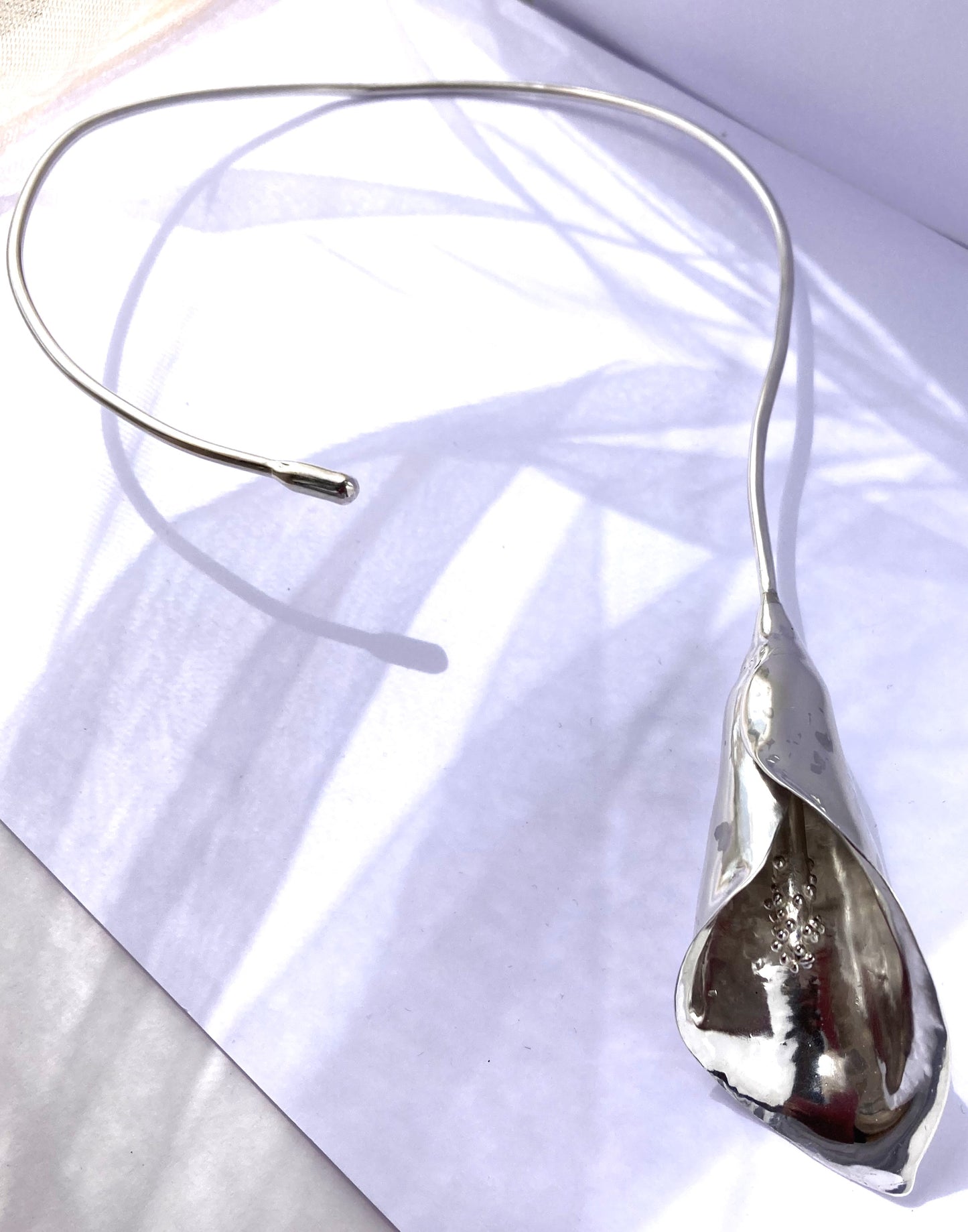 cala lily torque necklace hand forged in sterling silver