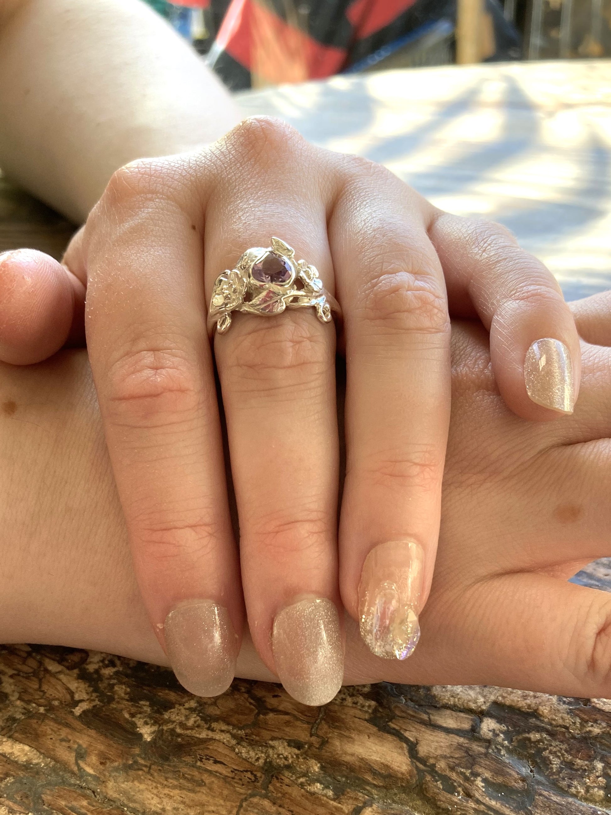 elvish floral stye amethyst ring on hands