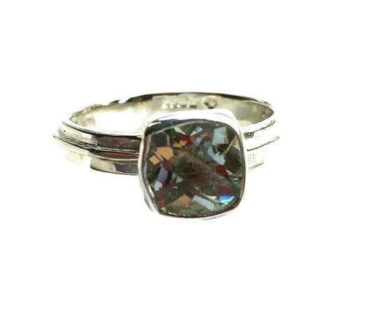 large green amethyst band ring on white background