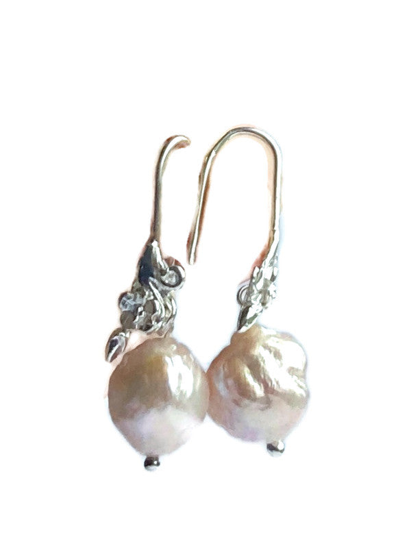 pink baroque pearl floral detail hook earrings on white background