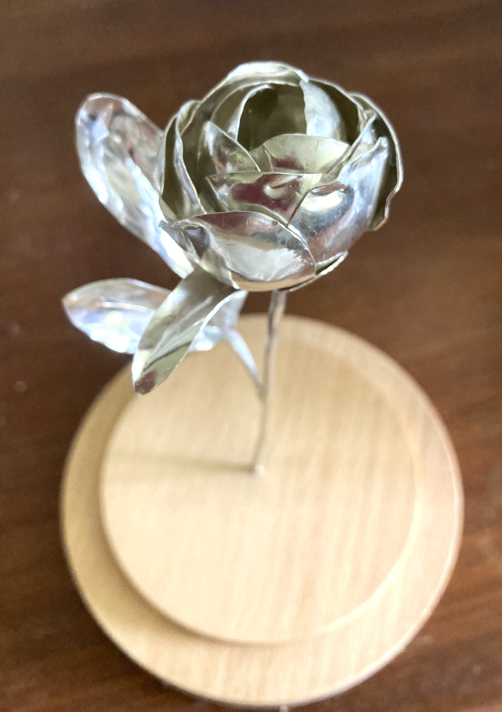 silver hand forged peony bud botanical sculpture on wood base