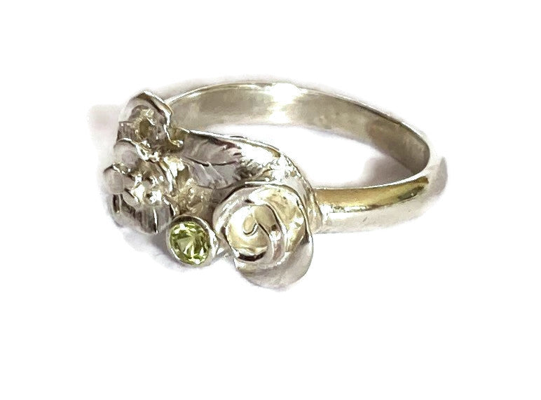 roses cluster ring in silver on white background