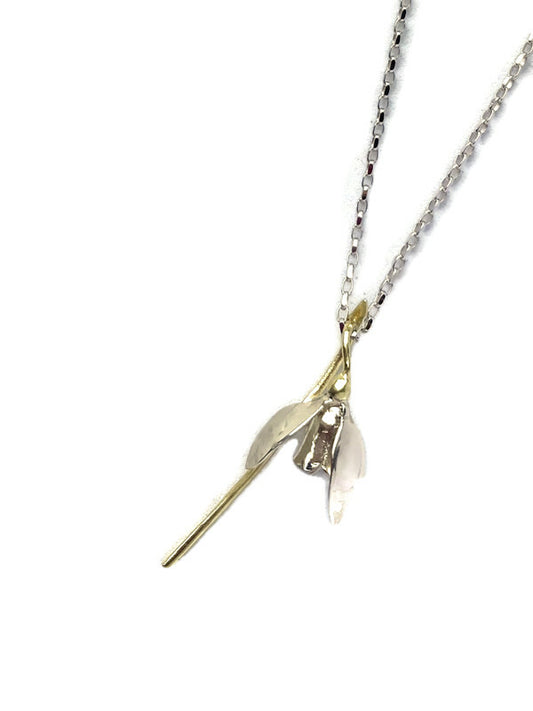 white gold snowdrop pendant on white background